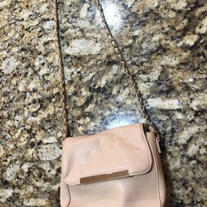 Beige purse with gold strap